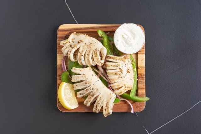 Fried Calamari prepared by Greek Mansion