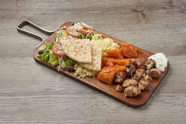 Pork Souvlaki Plate prepared by Greek Mansion