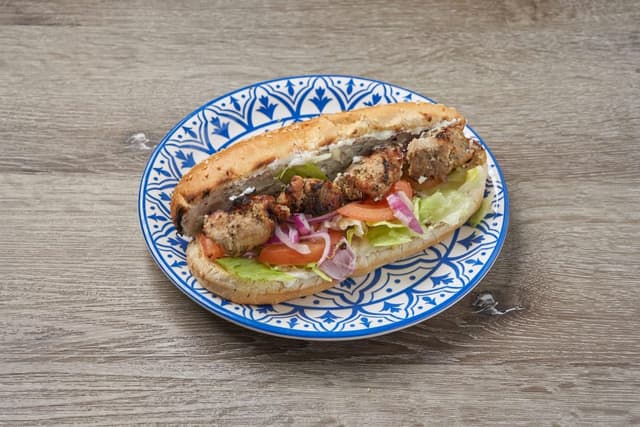 Pork Souvlaki Sandwich prepared by Greek Mansion
